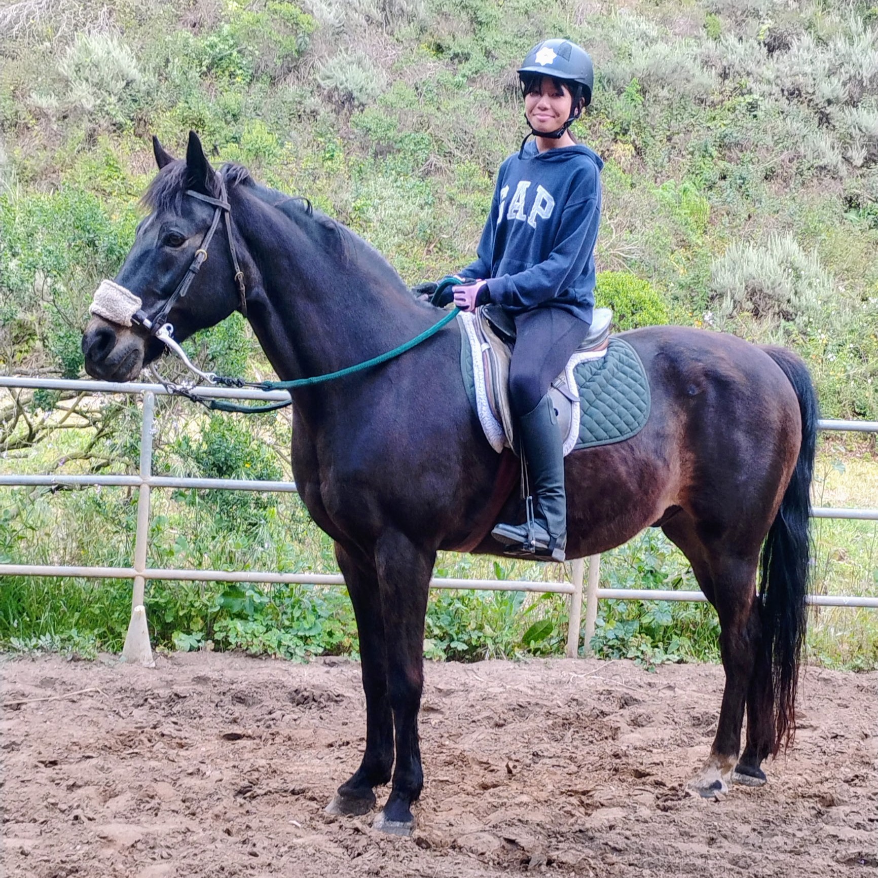 Camper riding confidently in the arena